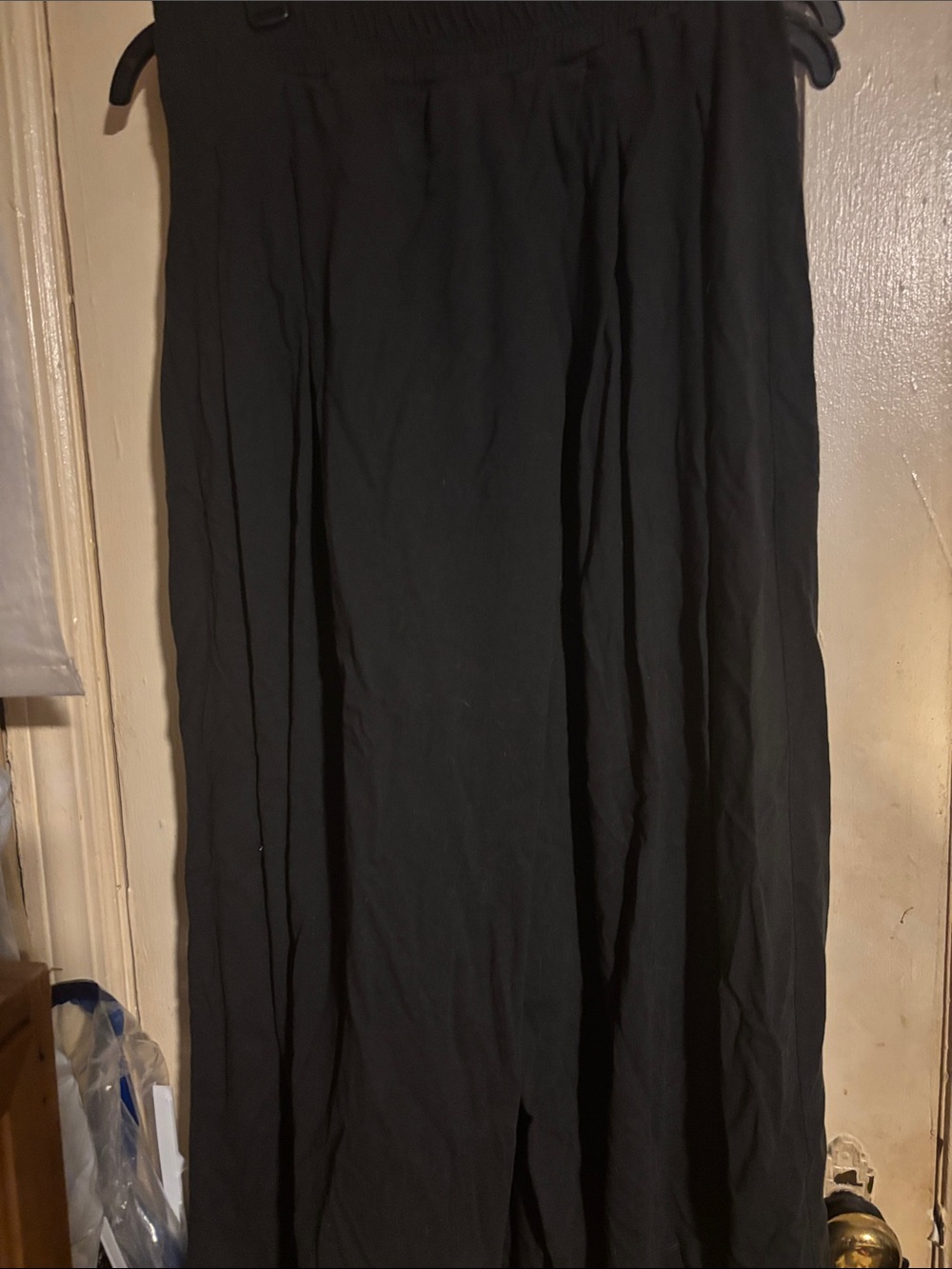 Amazing Free People wide leg skirted pants in black sz large. UNIQUE